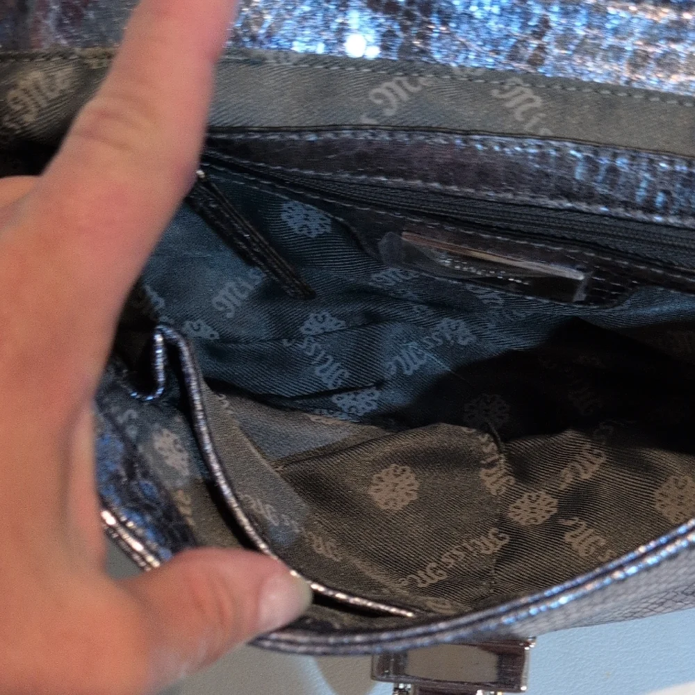 Miss Me Shimmering Silver Clutch